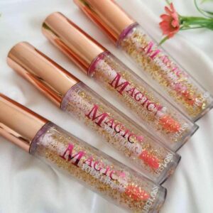 Блиск для надання об'єму губ Magic з блискітками прозорий.