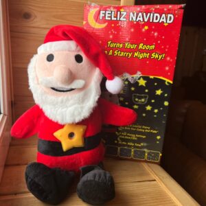 М'яка іграшка нічник-проєктор Дід Мороз Feliz Navidad