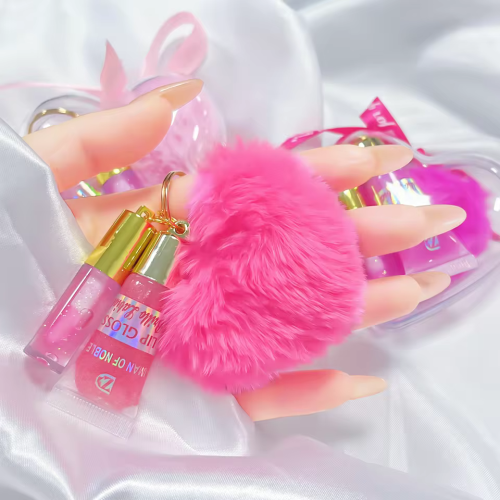 Набір блисків для губ 2-в-1 з меховим брелоком GLITTER LIP GLOSS IMAN OF NOBLE